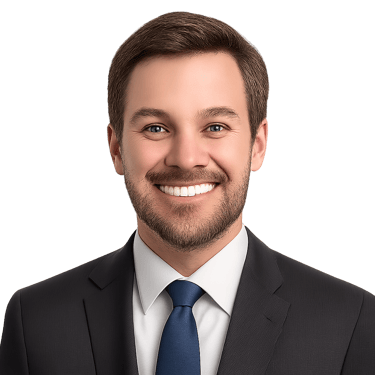 Professional headshot portrait of a smiling man in a suit, framed in a white circular border.