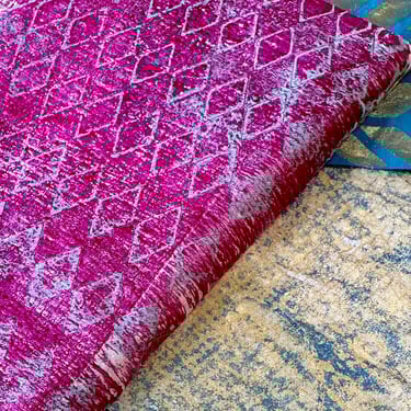 Turquoise and pink collage papers with layered stencil designs