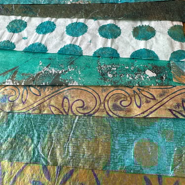 Turquoise and gold patterned hand-painted collage papers
