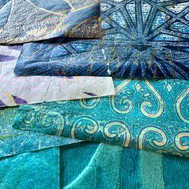 hand-painted collage papers layered in teal and blue with metallic patterns