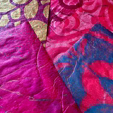 Pink hand-painted collage papers with bold stencil patterns