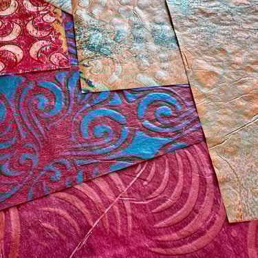 Pink and teal collage papers with layered abstract patterns