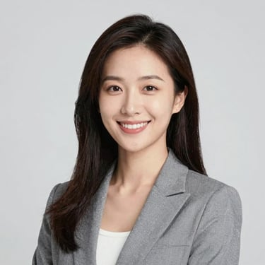 Bright studio headshot of a female gemologist, smiling, modern professional attire, neutral background