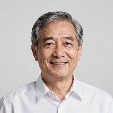 Professional headshot of a senior male astrologer, warm and trustworthy expression, neutral background