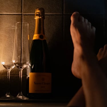 Feet-chilling-in-the-bathtub-with-a-bottle-of-champagne