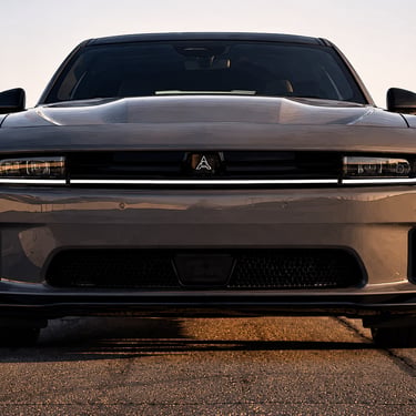 Illustrated frontal view of a 2026 Scat Pack Dodge Charger