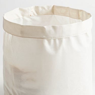 Bright high-key product photo of a large grocery bag with wide gusset, soft natural daylight, 50mm