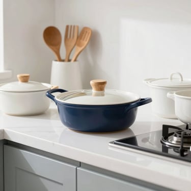 A beautifully organized kitchen counter with high-quality ceramic cookware and wooden utensils, soft daylight.