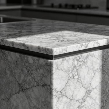 High-contrast close-up of a perfectly matched marble corner joint on a luxury kitchen island, showing flawless alignment.