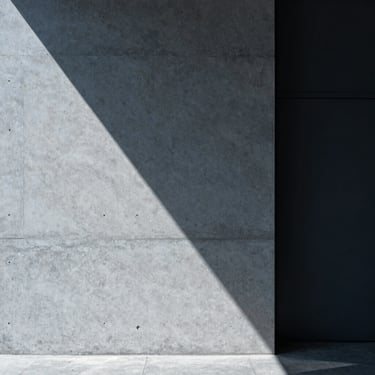 Sleek corporate photography, cool architectural daylight, sharp geometric shadows on a concrete wall, 35mm, minimalist slate tones.