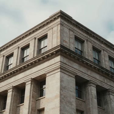Macro close-up of architectural details of a historic regional headquarters building, soft natural overcast daylight, deep shadows, clean lines.