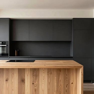 Minimalist kitchen with dark charcoal cabinetry and natural oak island, straight-on architectural shot, warm natural daylight