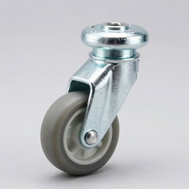Studio product shot of a medium-duty industrial caster wheel with solid grey elastic rubber tread, zinc-plated swivel rig, clean light grey background.