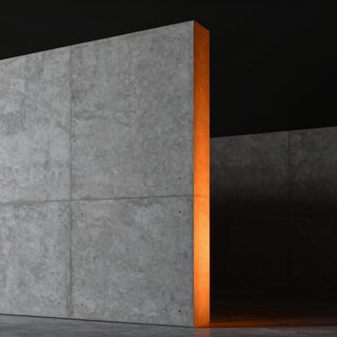 Minimalist concrete monolith in a dark space, a single sharp beam of orange light highlighting its edge, architectural monograph style.