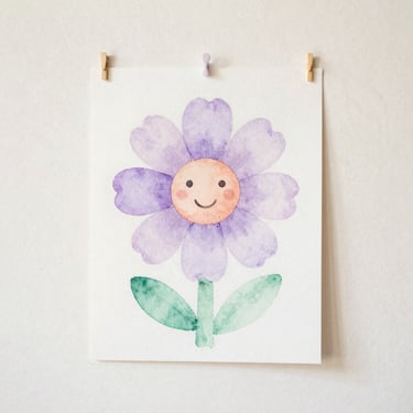 A child's watercolor painting of a giant friendly flower, soft lavender and mint washes, pinned to a sunny wall, 35mm photography