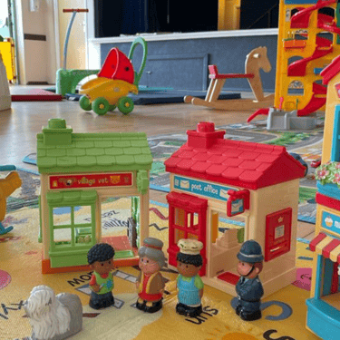 Role play toys and play mats inside Newport Playgroup at Newport Village Hall near Saffron Walden baby and toddler group