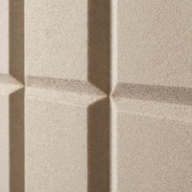 Macro shot of custom acoustic wool diffusion panels with a refined fabric weave, soft natural daylight casting gentle shadows.