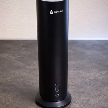 Slim tower air purifier standing on a countertop for cleaner indoor air
