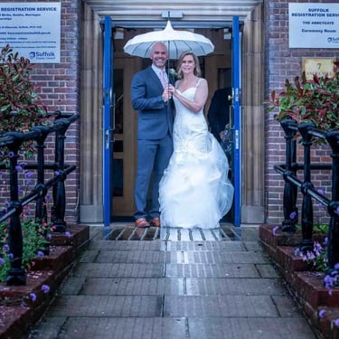 wedding couple utside bury st edmunds registry office