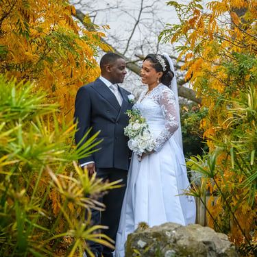 Wedding couple posing for a photograph