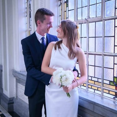 newly-weds in the corridor of Islington Town Hall after their wedding ceremony