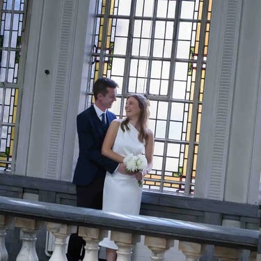 bride and groom standing inside Islington Town Hall