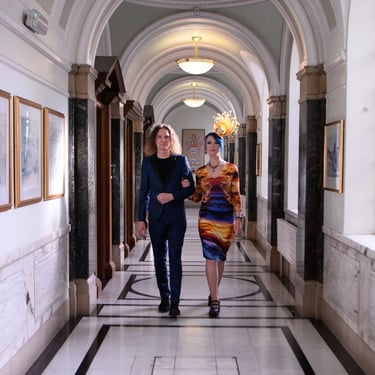 Wedding couple walking in hallway of Islington Town Hall
