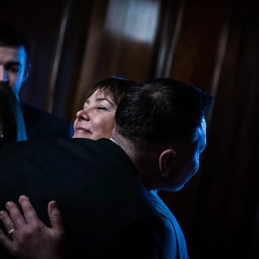 groom greeting one of his guests at old marylebone town hall