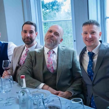 two grooms and best men at their wedding at Pembroke Lodge Richmond