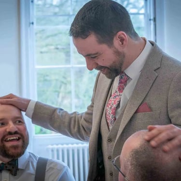 a groom walking around and speaking to his guests at Pembroke Lodge Richmond