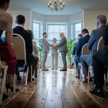 two grooms being married at their ceremony in Pembroke Lodge Richmond