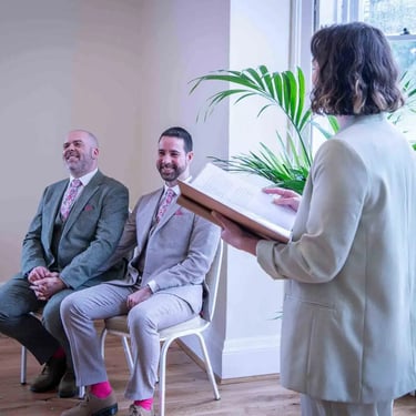 two grooms at their wedding ceremony