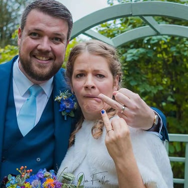 Newly weds posing in Southwark Registry Office