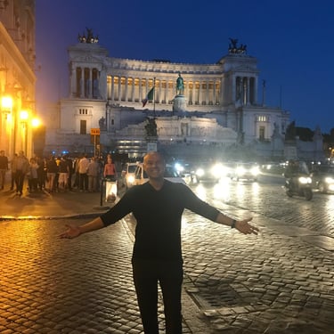 Mark Bulmer standing in front of a building in Rome