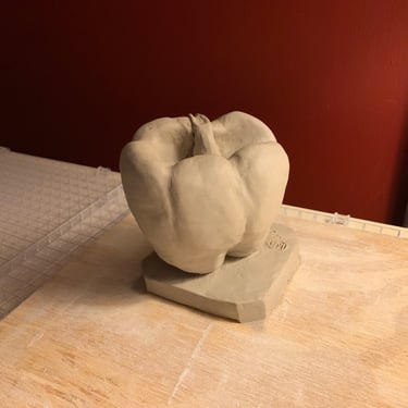clay sculpture of a pepper