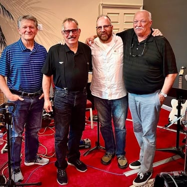 Musicians Steve Hickman, Jim Hallengren, Bob Satgner, and Mike Colbaugh