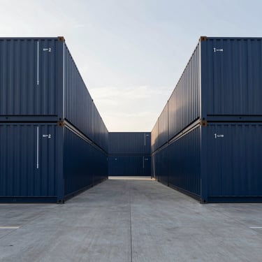 Symmetrical wide shot of a modern logistics terminal in Lyon, clean lines, morning light, elegant corporate photography, 35mm