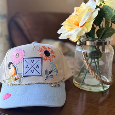 mama hat with flowers and bird