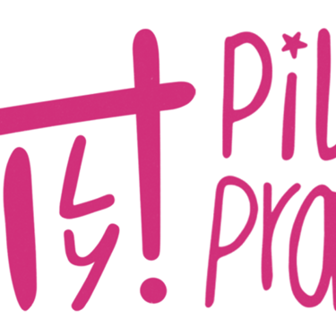 a woman with glasses and a pink shirt