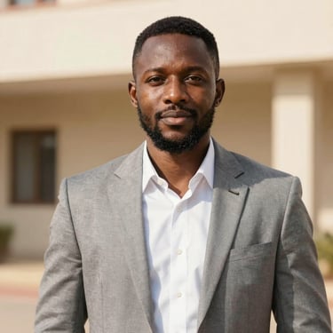 Professional studio portrait of a West African male project manager, warm natural light, professional