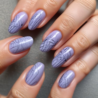 A happy customer showing off her beautifully designed nails.