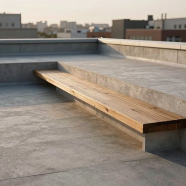 An urban flat roof transformed into a minimalist concrete terrace with integrated timber seating, low golden hour light.