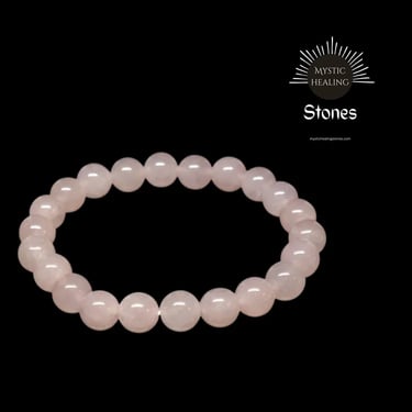 A round rose quartz crystal beaded bracelet for healing and love on a black background.