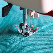 Acercamiento a máquina de coser