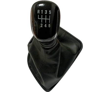 Black leather 6-speed manual car gear shift knob with boot cover isolated on white.
