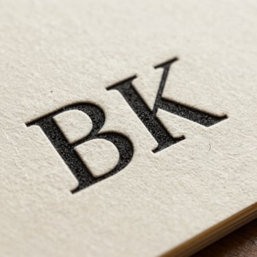 Macro detail of letterpress ink on heavy cream paper stock, showing textured fiber and sharp serif typography.