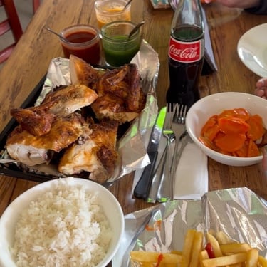 Las Brasas Chicken dinner with fries and rice