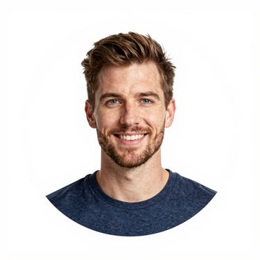 A rugged skid steer leveling a freshly graded driveway under a clear blue sky.