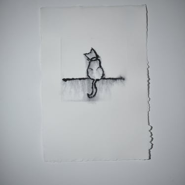 Print of cat on paper  from glass etching