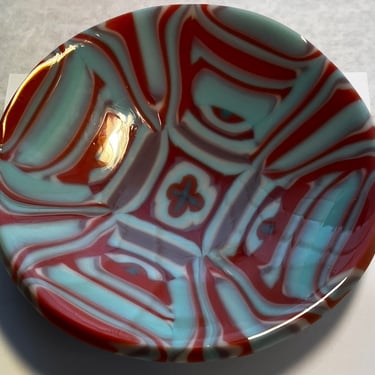 Red and aqua green fused glass bowl created from pattern bars